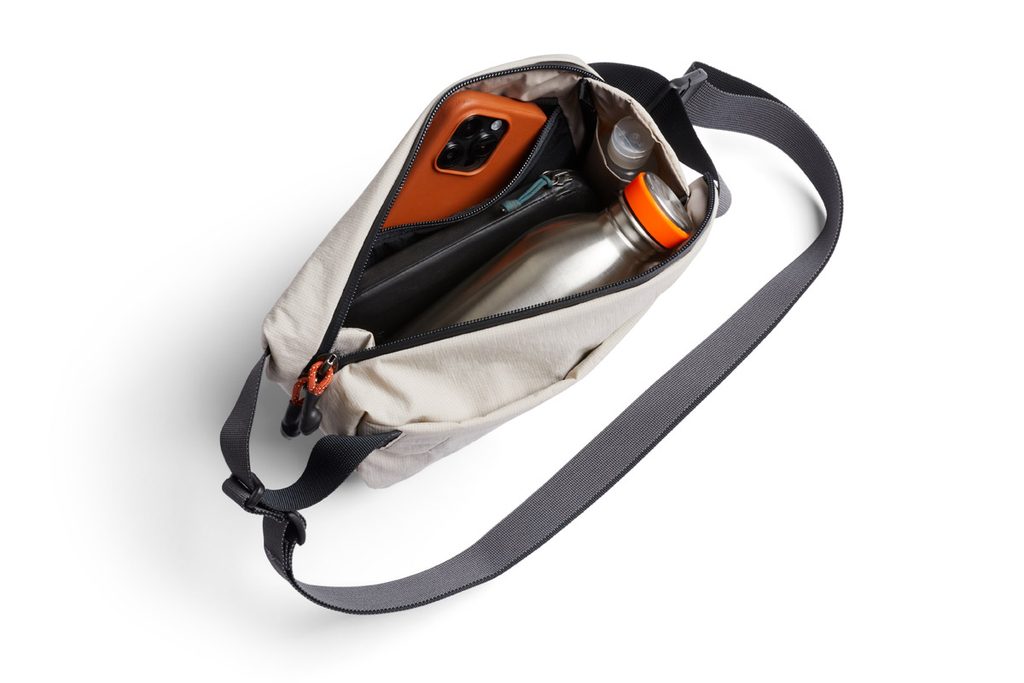 Bellroy Lite Sling Mini open interior with everyday essentials