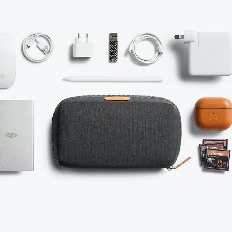 Bellroy Tech Kit Slate flat lay with tech accessories