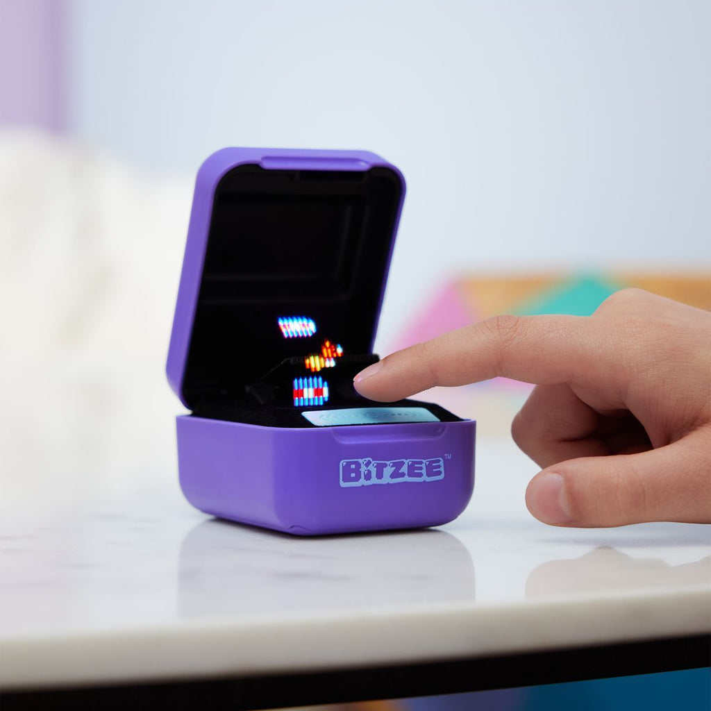 Bitzee interactive digital pet being touched