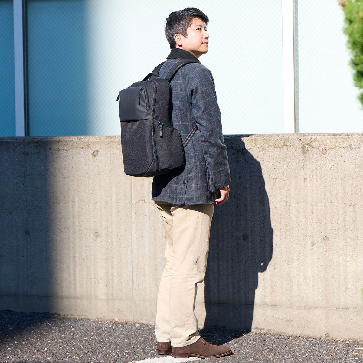 Incase A.R.C. Daypack 24L worn in urban setting