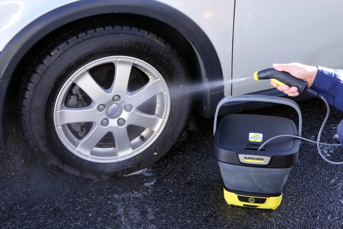 Kärcher OC 3 Foldable cleaning a vehicle wheel
