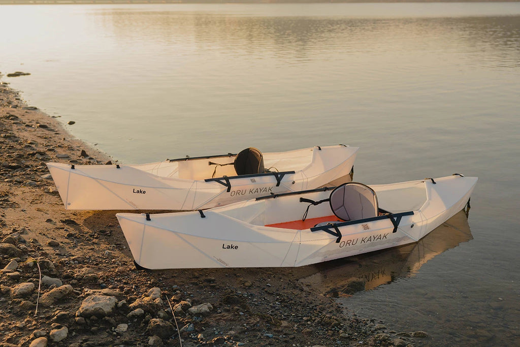 Oru Kayak Lake folding kayaks beside water