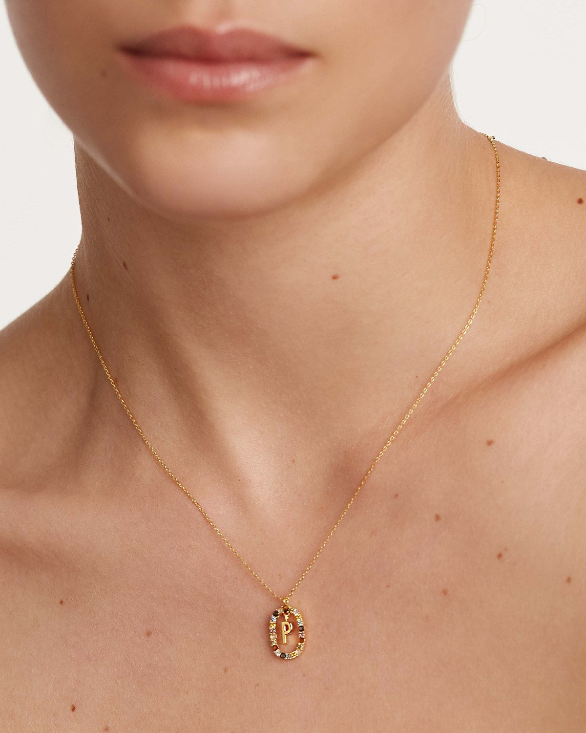 PDPAOLA Letter P necklace worn by model
