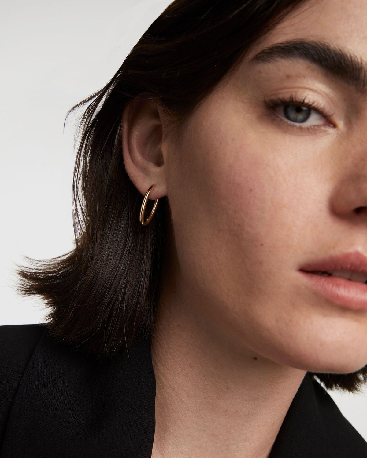 PDPAOLA Vera Hoops solid 18K gold worn on model