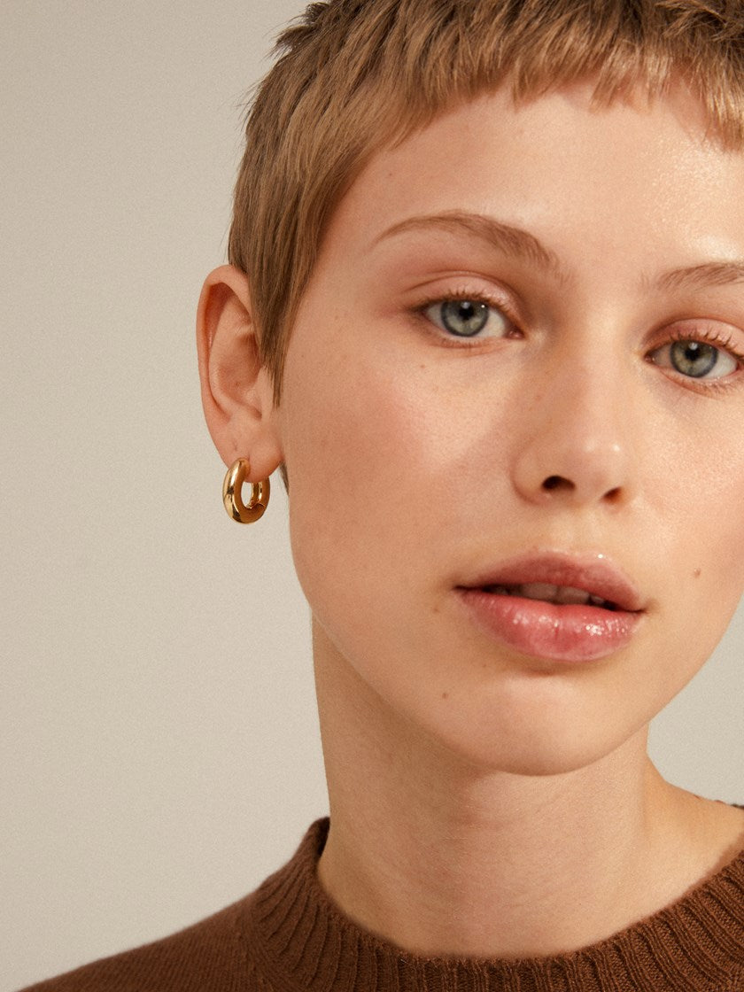 Pilgrim AICA chunky gold-plated hoop earrings worn by model