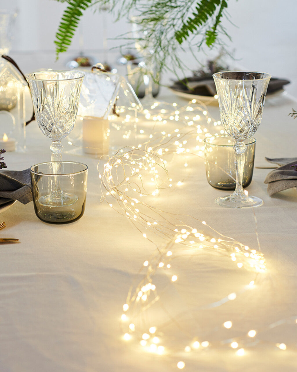 Sirius Knirke warm white micro LED string lights styled on a festive table