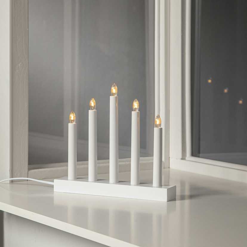 Star Trading Inez Advent candlestick on windowsill