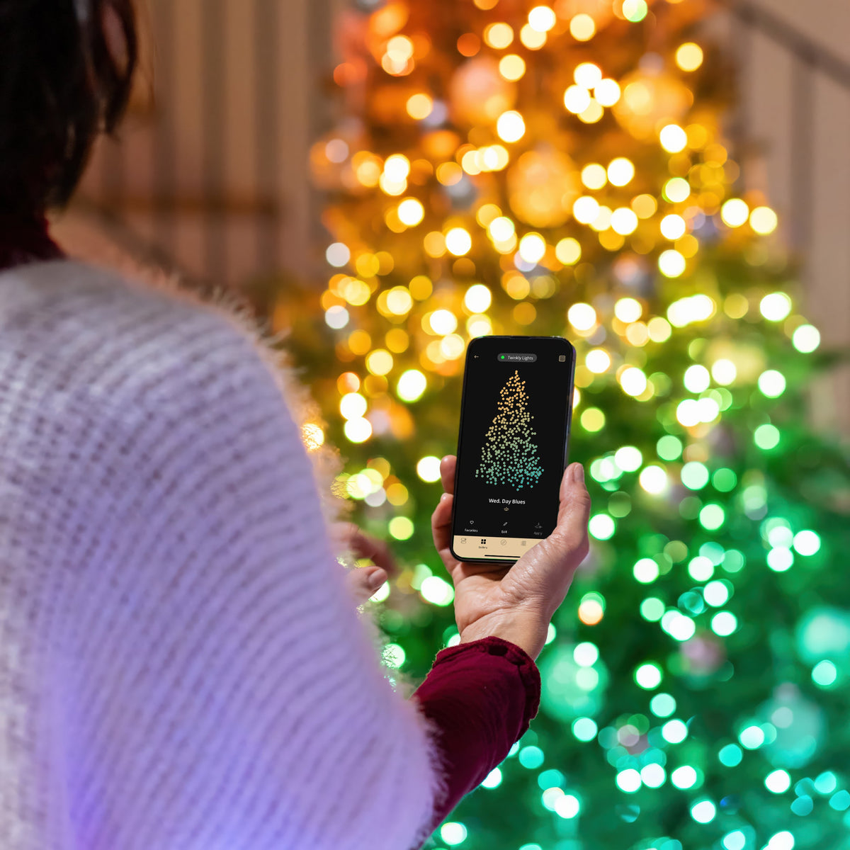 Twinkly smart candle-shaped Christmas lights in a festive interior
